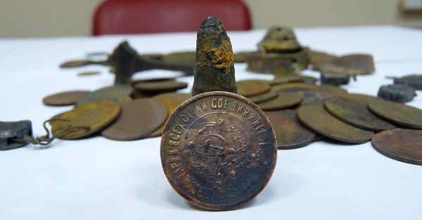 Пуля, деньги, серп и молот... (о кладе, найденном в апреле 2015 года)